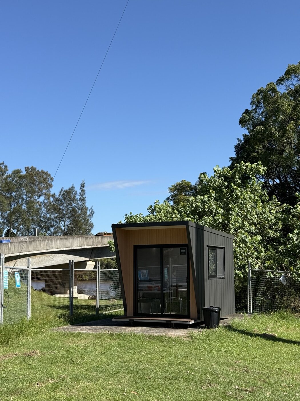 Compact accommodation pod on a lawn